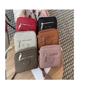 Genuine leather women motorcycle clutch bag, multi-color double zipper design with front pocket.