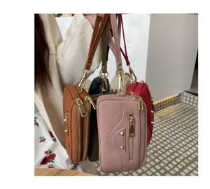 Genuine leather women phone bag motorcycle style multi-color zipper wristlet detail