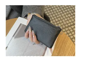 Vintage leather coin purse for women, small minimalist card holder and zipper wallet.