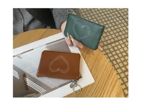 Genuine leather coin purse for women, retro vintage style card holder with cute heart stitching and key ring.