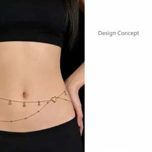 Detail view of multi-layer body chain with sparkling rhinestones and heart pendant.