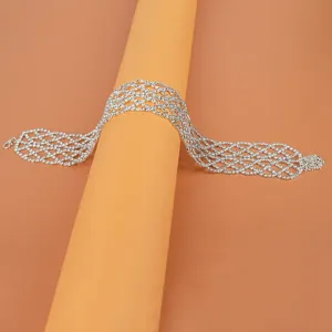 Detailed view of a sparkling rhinestone mesh body chain, perfect for party wear and night clubs.