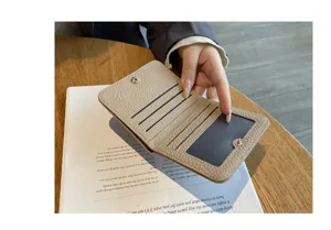 Genuine leather card holder wallet detail showing multiple card slots and compact short fold design.