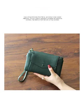 Green leather wristlet clutch bag for women, simple stylish phone purse and wallet.