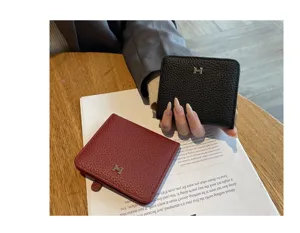 Genuine leather women's short wallet with metal H buckle, compact minimalist card bag design.