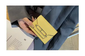 Yellow leather card holder compact wallet with metal clasp stylish mini purse chic accessory