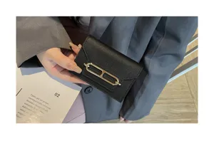 Elegant black leather card holder wallet for women, premium cowhide with stylish metal clasp
