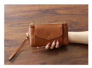 Brown cowhide leather clutch bag for women, minimalist daily wristlet purse with zipper.