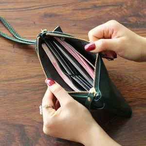 Dark green leather clutch wallet for women, large capacity zip purse with card slots.