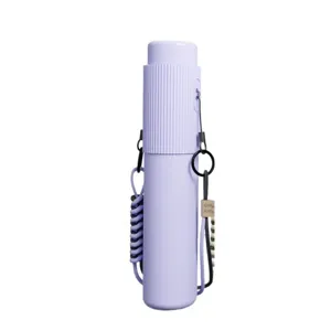 Parapluie mini capsule violet portable avec lanière élégante, protection solaire UV.