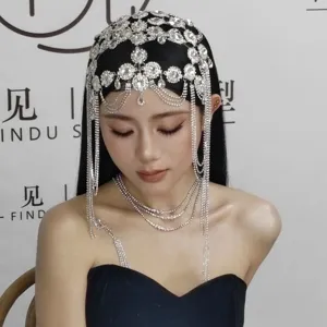 Exquisite crystal tassel hair chain and layered necklace set, elegant bridal jewelry decor.