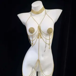 Stunning gold rhinestone body chain with butterfly pendant, perfect for clubbing and party wear.