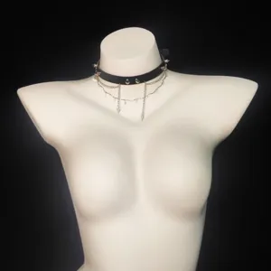 Punk leather choker necklace with metal spikes and multi-layer chains for women and girls.