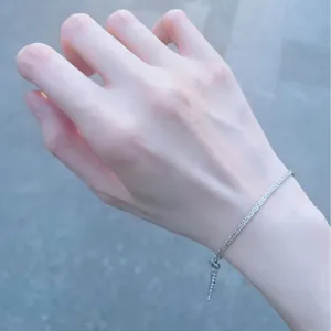 Delicate silver chain bracelet or necklace, sparkling minimalist design for daily wear.