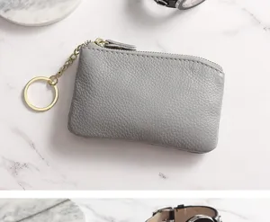 Close-up detail of the grey genuine leather coin purse with practical metal key ring.
