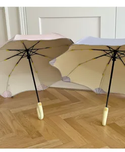 Parapluie pliant de protection solaire anti-UV avec coins arrondis et design contrasté.