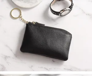Black genuine leather coin purse with zipper closure and practical keychain ring detail