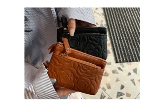 Genuine leather coin purse, top layer cowhide mini wallet with floral embossed design.