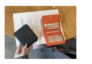 Mini leather wallet for women short card holder stylish cowhide small purse chic design.