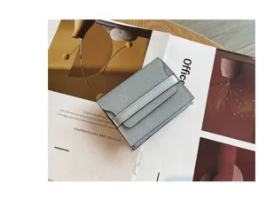 Minimalist genuine leather card holder for women, compact multi-slot mini wallet.