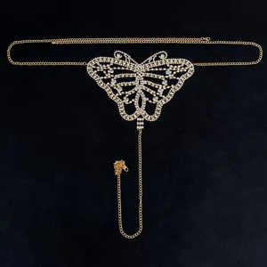 Gold rhinestone butterfly body chain detail view showing sparkling crystal inlay and delicate link.