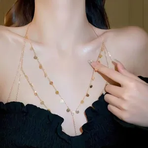 Exquisite multi-layer sequin chest chain detail shot, showcasing trendy minimalist body jewelry design.