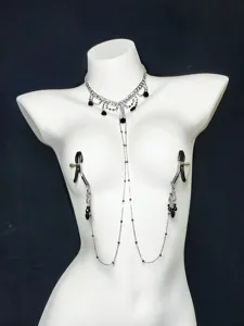 Sexy silver body chain with black teardrop pendant and nipple clamps for women fashion accessory.