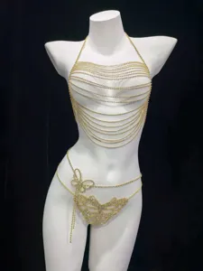 Detailed view of the sparkling rhinestone body chain, highlighting the delicate butterfly waist.