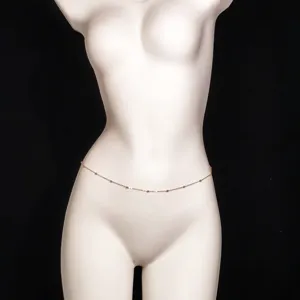 Minimalist delicate waist chain for women, chic body jewelry, fashion accessory.