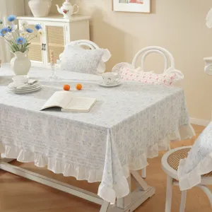 Pastoral style cotton jacquard printed tablecloth with ruffles and fresh floral pattern.