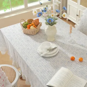 Pastoral cotton jacquard tablecloth with cute ruffle skirt edge design for dining room decor.