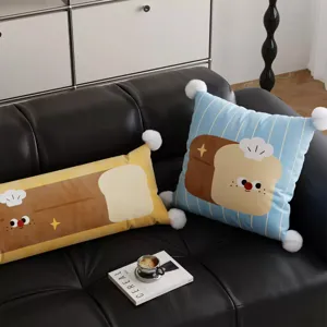 Cute cartoon bread shape throw pillow detail, soft plush fabric for cozy sofa decor.