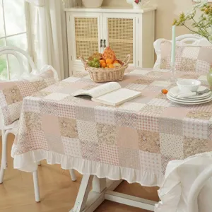 Detail view of the American style 100% cotton patchwork tablecloth with ruffle skirt hem.