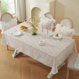 Pastoral style cotton jacquard floral tablecloth with cute pom pom ruffles for home decor.