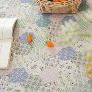 American cotton tablecloth detail, hexagonal patchwork floral pattern, cozy rustic style decor.
