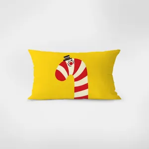 Vue détaillée du coussin rectangulaire jaune doté d'un joli motif de canne à sucre.