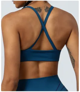 Back detail of the blue sports yoga bra featuring comfortable cross straps for fitness and yoga.