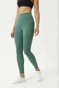 High waist brushed yoga leggings detail showing soft nude feel and butt lifting fit.
