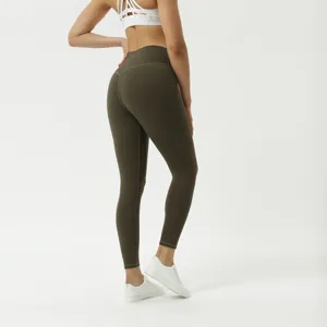 Detail view of high-waist peach-skin yoga leggings, showcasing seamless stitching and butt-lifting design.