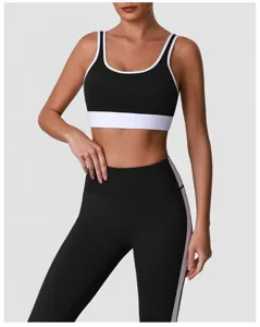 Schwarzes und weißes Sport-BH und High-Waist Fitness Yoga Leggings Set für Damen.