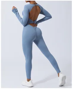 Backless long sleeve yoga jumpsuit, seamless activewear with butt lift design for fitness training.