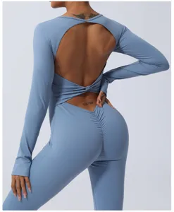 Backless long sleeve yoga jumpsuit solid blue quick dry fitness activewear romper.