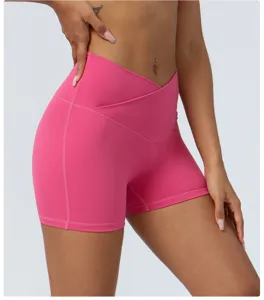 High waist cross yoga shorts for women, pink stretchy fitness running gym shorts peach lift.