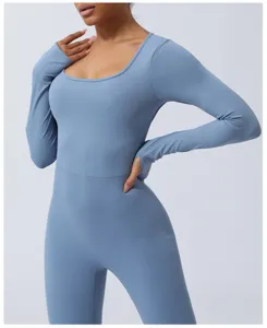 Blue long sleeve fitness jumpsuit activewear detail closeup view for women gym training