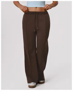 Pantalon de survêtement marron ample et confortable pour femme, idéal pour le yoga et le sport.