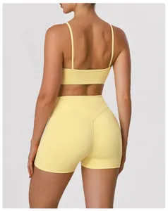 Women yoga set sports bra and high waist workout shorts fitness activewear yellow back view