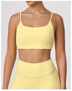 Soutien-gorge de sport jaune, top de yoga fitness élastique, vêtement confortable.