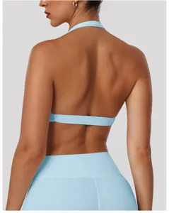 Back detail view of light blue halter yoga sports bra, perfect for fitness and running workouts.