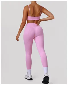 Back detail of pink fitness yoga set, high waist hip lifting leggings and supportive sports bra.
