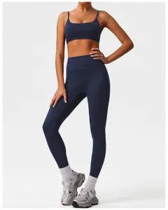 Seamless high-waist yoga set with sports bra and athletic leggings for gym fitness.